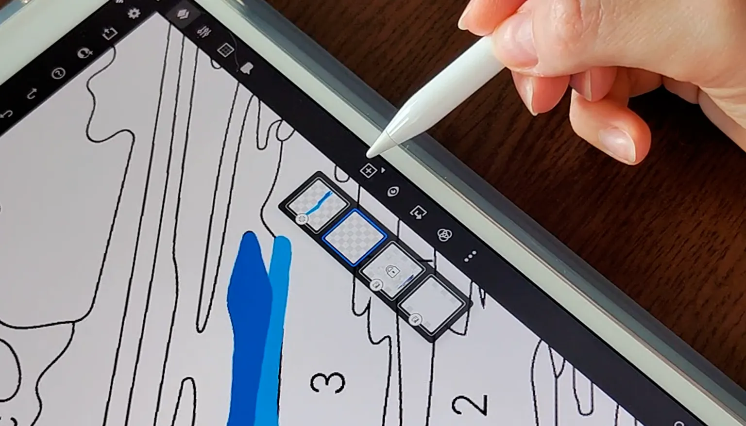 Layers panel in a drawing app with the coloring page and color layers