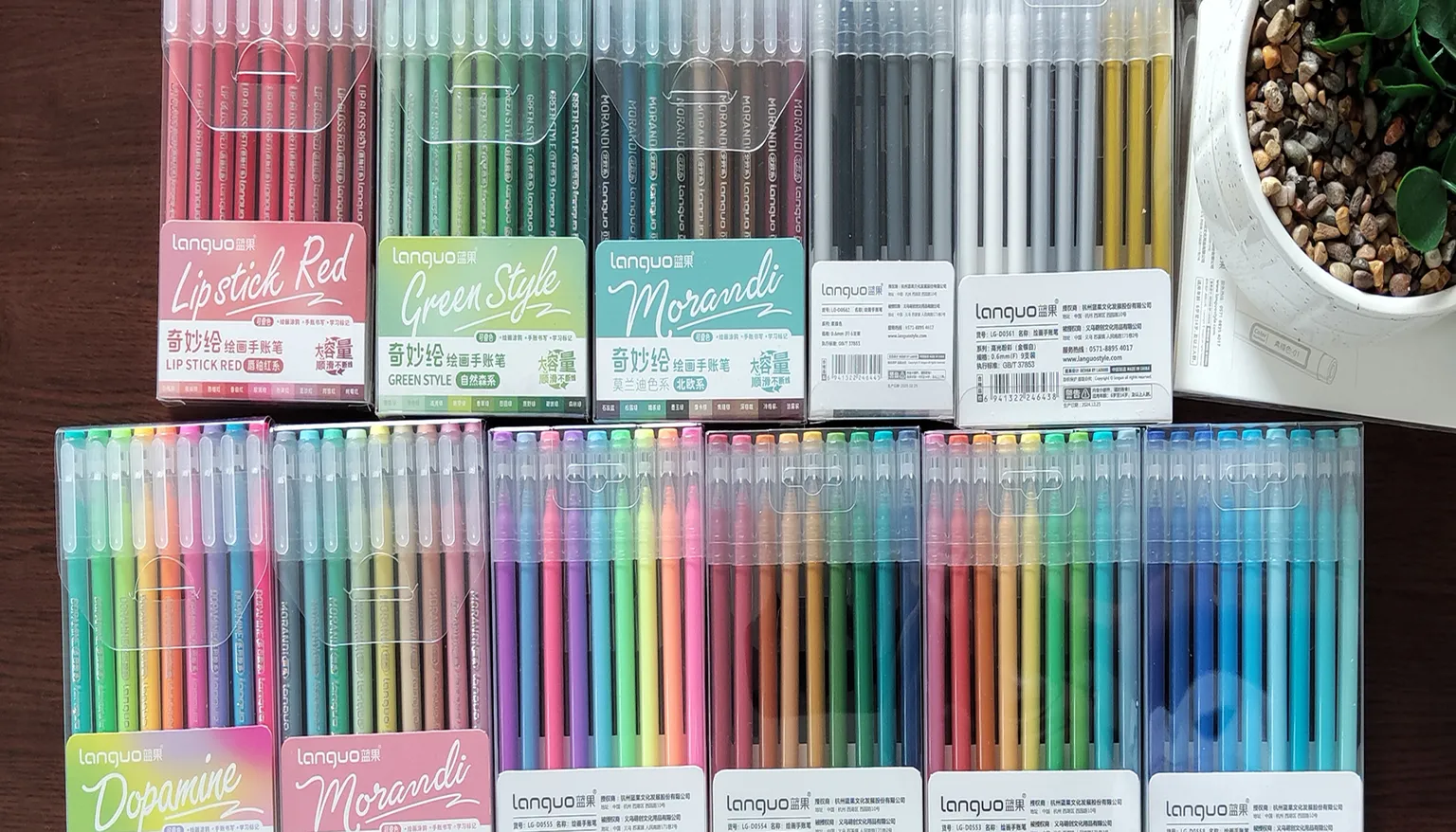 Sets of colorful gel pens and markers for coloring